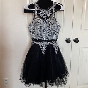 Gorgeous black dress with silver detailing! 🌹